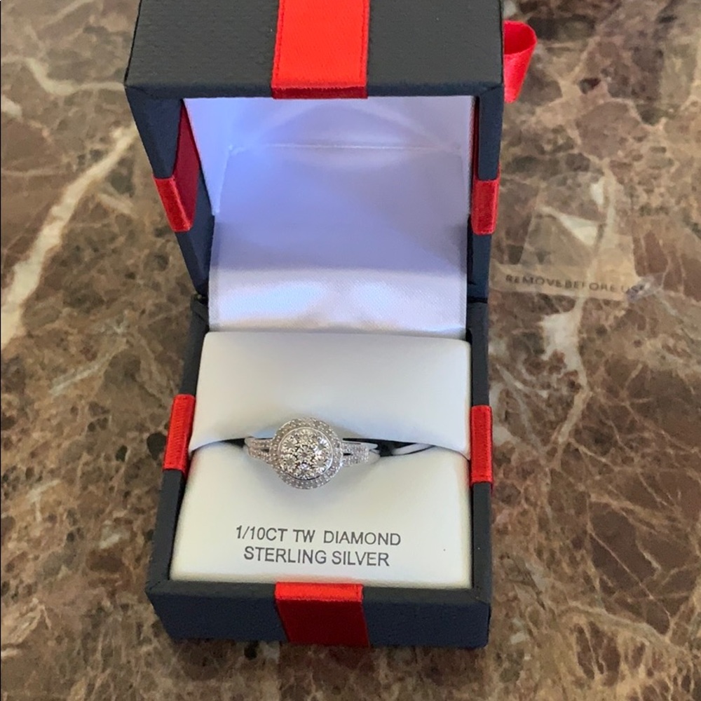 1/10 CT TW Diamond Sterling Silver Ring.